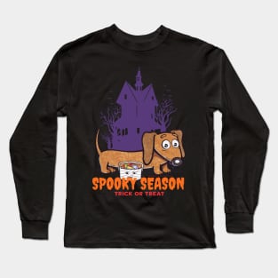 Funny and cute haunted house Doxie Dachshund during spooky season with scary house and trees Long Sleeve T-Shirt